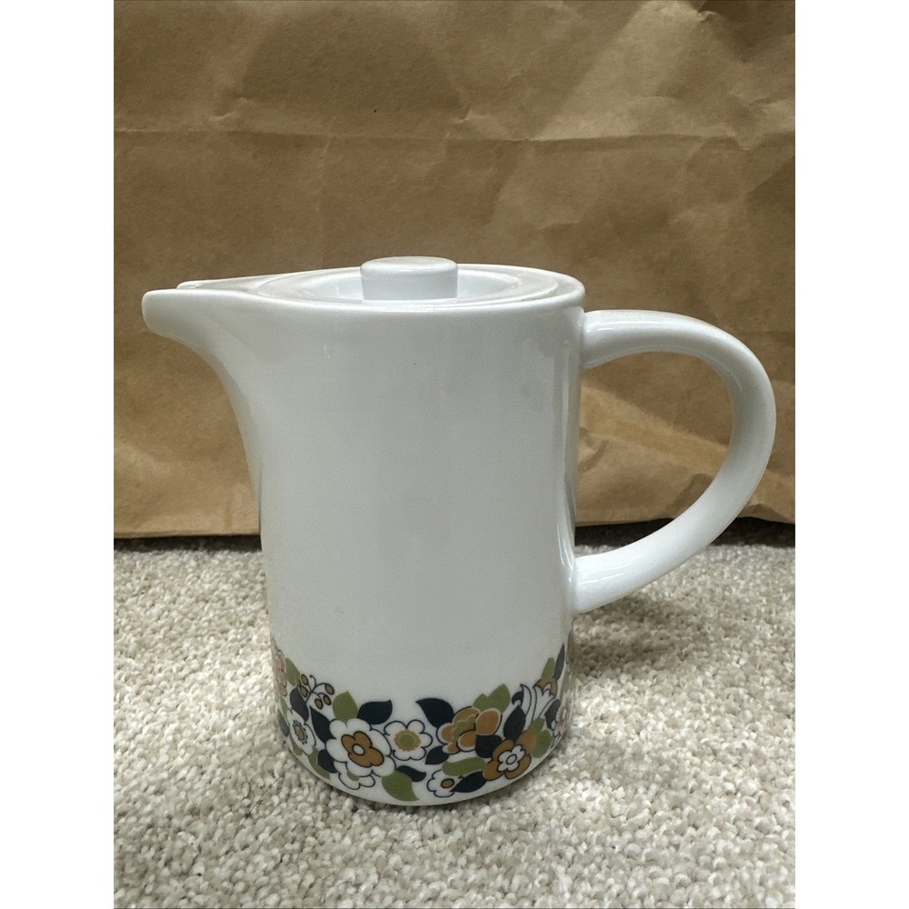 Vintage cream pitcher in the retro floral, manufactured by Suisse Langenthal